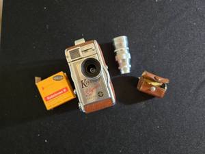 lot 42 image: Keystone Olympic K-32 Movie Camera with Film and Extra Lens