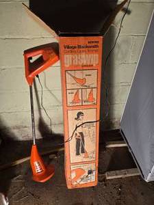 lot 214 image: Village Blacksmith Cordless Grass Trimmer