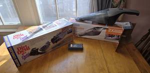 lot 271 image: New Dirt Devil In Unopened Box & Black & Decker Dustbuster