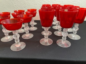 lot 97 image: Spanish Tangerine by Heishey with 8 ChampagneTall Sherbert and 11 WineWater Glasses
