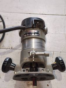 lot 53 image: Rockwell heavy-duty router, base and guide