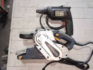 lot 55 image: Corded drill and belt sander