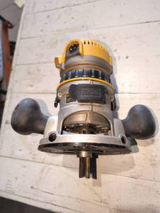 lot 59 image: DeWalt DW616 router and base