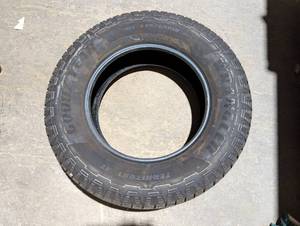 lot 77 image: Goodyear Wrangler Territory AT 27565R18 Tire