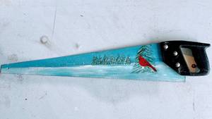 lot 1 image: Painted Saw Decor.