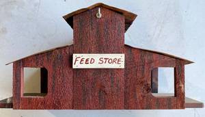 lot 27 image: Decorative bird house