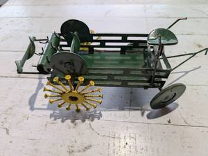lot 84 image: John Deere Inspired Toy Sculptures and Cast Iron Truck