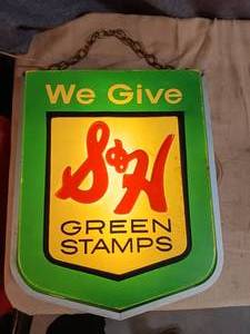 lot 52 image: Vintage we give green stamps lighted sigh