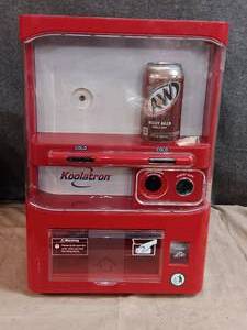 lot 55 image: Koolatron model ec-23 mini soda vending machine