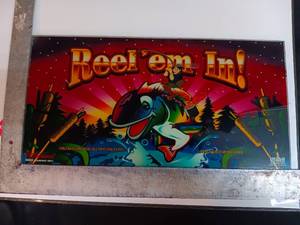 lot 64 image: Reelem In slot machine glass sign
