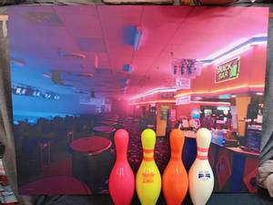 lot 65 image: Large Canvas photo of Sun Ray Lanes and 4 neon bowling pins