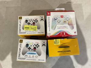 lot 362 image: Lot of 4 Miscellaneous Game Controllers