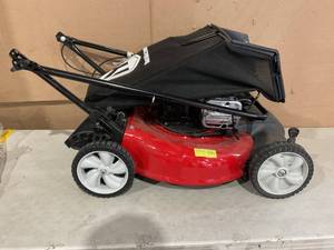 lot 374 image: Yard Machines 21-in Walk Behind Push Lawn Mower with 140cc Briggs & Stratton Gas Powered Engine