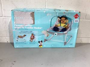 lot 494 image: Disney Baby 2-in-1 Slip Resistant Vibrating Infant & Toddler Baby Rocker Chair, Mickey Mouse by Bright Starts