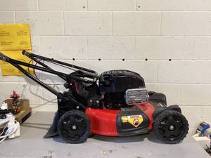 lot 589 image: Yard Machines 21 RWD Walk Behind 150cc Gas Powered Lawn Mower