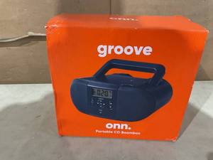 lot 200 image: Groove Onn. Portable CD Boombox with Digital FM Radio