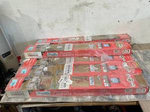 lot 192 image: LOT OF 7 Select Surfaces Sand Dune SpillDefense Laminate Flooring