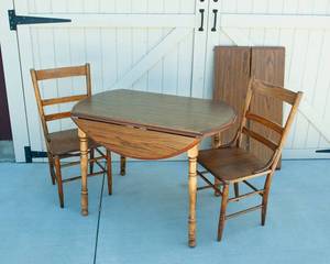 lot 221 image: Drop Leaf Table with Two Extension Leaves and Two Chairs
