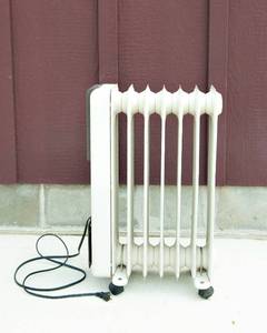 lot 32 image: De Longhi Heater