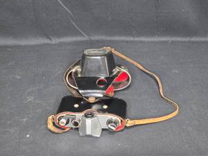 lot 119 image: Vintage Movie Camera with Strap - Classic Design