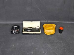 lot 124 image: Olympus XA 35mm Camera with A16 Electronic Flash and Case