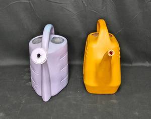 lot 26 image: Set of 2 Vintage Watering Cans - Purple and Yellow