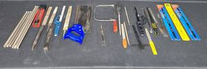 lot 28 image: Assortment of Hand Tools Including Files, Saw Blades, and Hardware