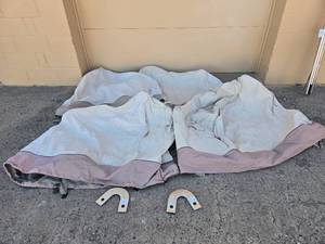 lot 34 image: Group of 4 Tarp covers with 2 Metal Hinge Brackets and Support Poles