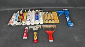 lot 159 image: Assortment of Caulking Tubes and Drywall Tools - Group of 12 Items
