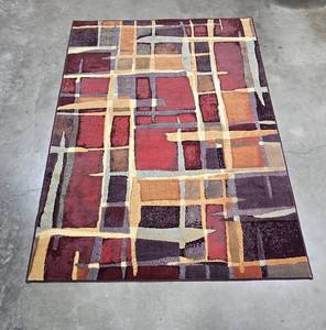 lot 219 image: Stylish 54 x 78 Area Rug with Geometric Patterns - Multicolor