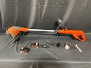 lot 10 image: BlackDecker 20V Lithium Cordless String Trimmer with Batteries and Accessories