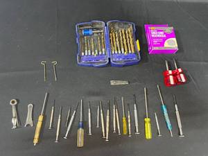 lot 64 image: Assorted Tool Set with Drill Bits, Caulk Cord and Screwdrivers