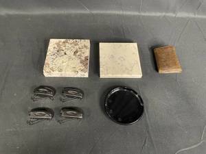 lot 168 image: Assorted Set of 4 Clothespins, 2 Marble Coasters, Black Round Tray, and Vintage Leather Wallet