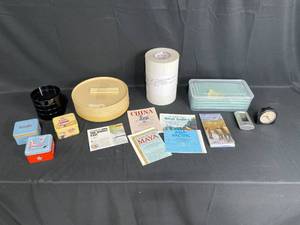 lot 177 image: Assortment of Household Items - Includes Tins, Travel Guides, Clocks, and More