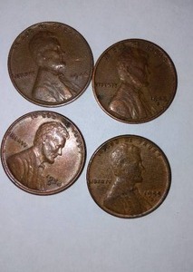 lot 394 image: Lincoln D WHEAT One Cent Penny (4). Years 1946, 51, 53.