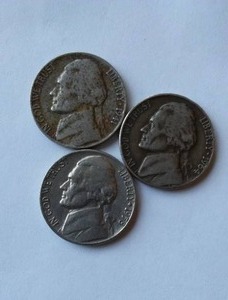 lot 410 image: Jefferson Five Cent Nickel (3). Years 1941,58,64.