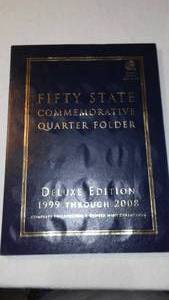 lot 589 image: FIFITY STATE COMMEMORATIVE QUARTER FOLDER 1999 Through 2008.