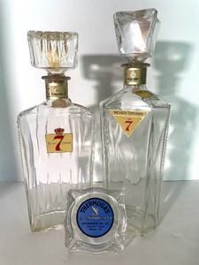 lot 43 image: Vintage Liquor Bottles Seagram 7 Decanters with Iowa Certification Sticker