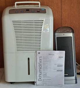 lot 161 image: GE Dehumidifier and Oscillating Lasko Heater