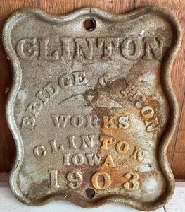 lot 113 image: Clinton Iowa Cast Iron Sign 1 of 2