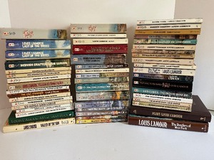 lot 149 image: Louis Lamour Books Lot Hardcover and Paperback