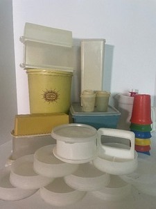 lot 255 image: Vintage Tupperware LOT- Pitcher, Canisters, Cups, Hamburger Press, Salt & Pepper Shaker, Cookie Bin, Velveeta Cheese Keeper and More