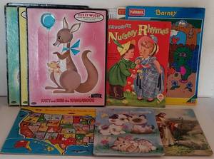 lot 281 image: Fuzzy Wuzzy Flocked Preschool Puzzles, Nursery Rhyme Books