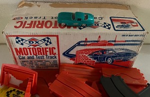 lot 279 image: Vintage Motorific Car and Test Track - Slot Racing Jump Kit with 1964 Chevy Corvette Car