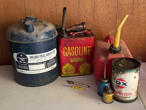 lot 214 image: Vintage Garage - Metal Gas Cans, Metal Oiler and More