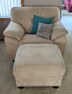 lot 28 image: Taupe Microsuede Armchair and Ottoman