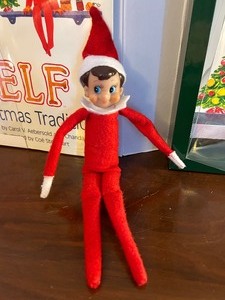 lot 54 image: Elf on the Shelf with Book and Elf