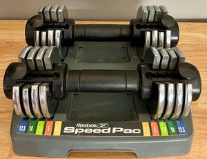 lot 121 image: Set of Handheld Reebok Speed Pac 25 Adjustable Dumbbells