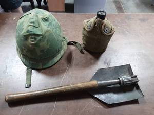 lot 9 image: Army Helmet, Canteen, Folding Shovel