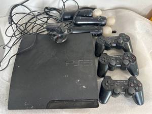 lot 6 image: Sony PS3 with Lots of Controllers